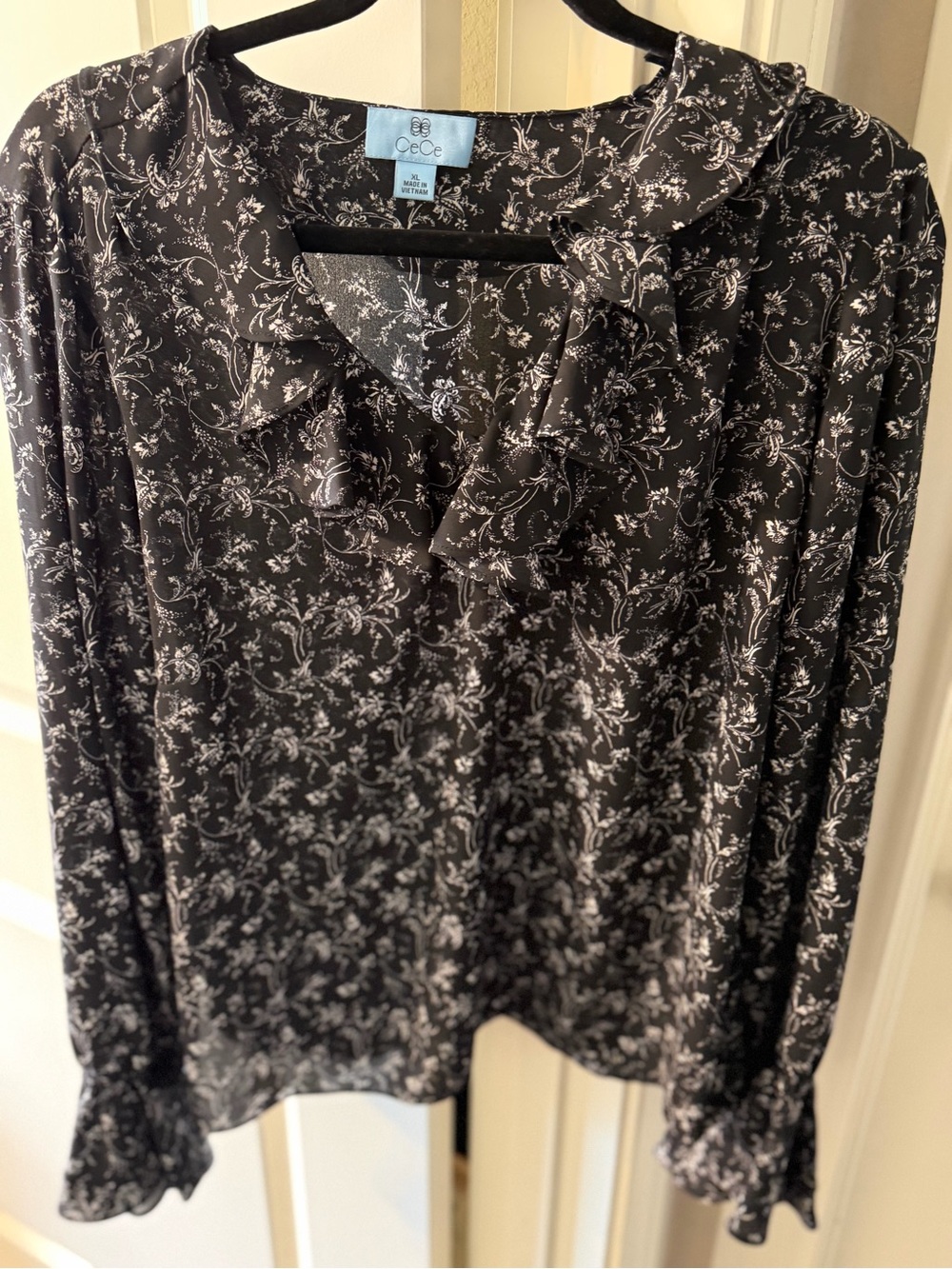 CeCe Black and White Floral V-Neck Blouse